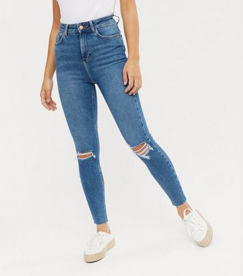 high waisted skinny blue ripped jeans