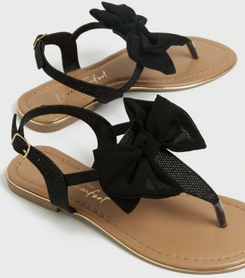 Black flat sandals with sales bow