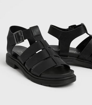 black caged sandals