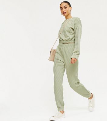 green cuffed joggers
