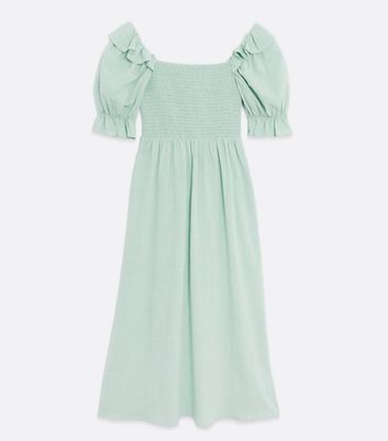 green shirred midi dress
