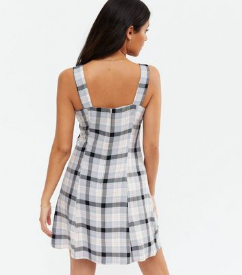 white check ruffle pinafore mini dress