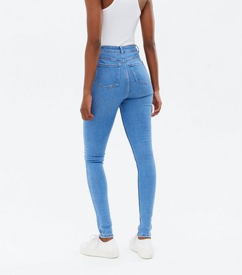 blue ripped super skinny jeans