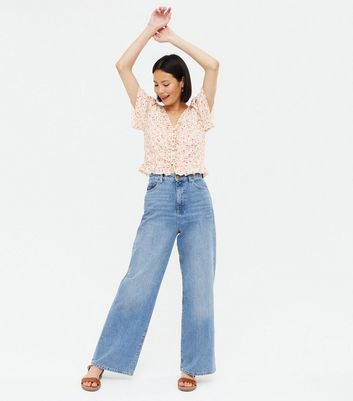 Click to view product details and reviews for White Ditsy Floral Frill Trim Tea Blouse New Look. Click to view product details and reviews for White Ditsy Floral Frill Trim Tea Blouse New Look.