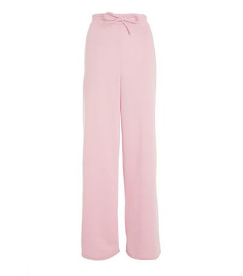 light pink wide leg trousers