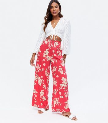 Curves Black Geometric Floral Flared Trousers | New Look