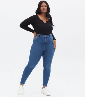 Click to view product details and reviews for Curves Blue Mid Wash Lift Shape Jenna Skinny Jeans New Look.