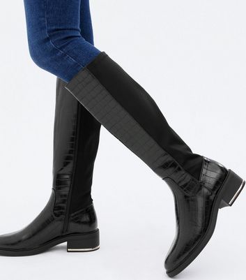 black flat knee high boots