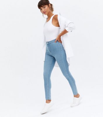 light blue high rise skinny jeans