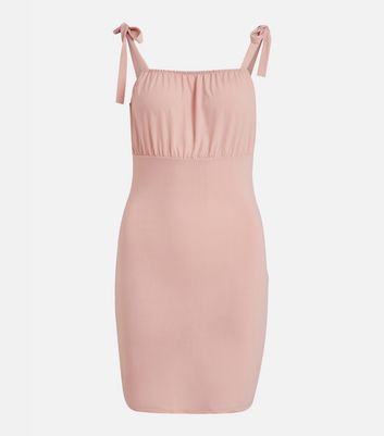 Click to view product details and reviews for Vila Pale Pink Ruched Tie Strap Mini Dress New Look.