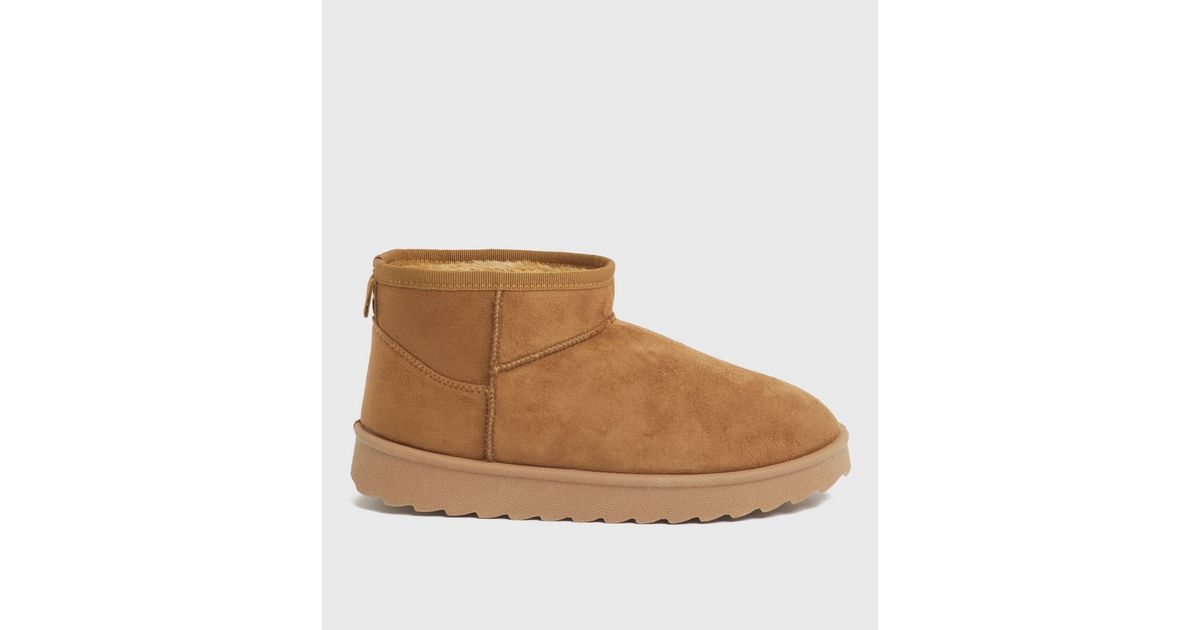tan faux shearling lace up chunky boots