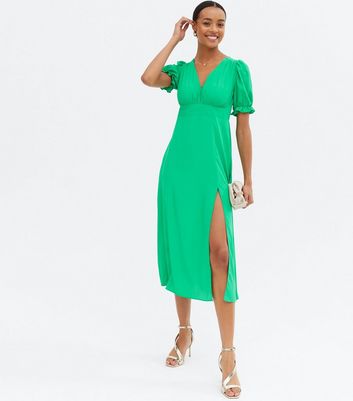 Click to view product details and reviews for Green Open Tie Back Puff Sleeve Midi Dress New Look.