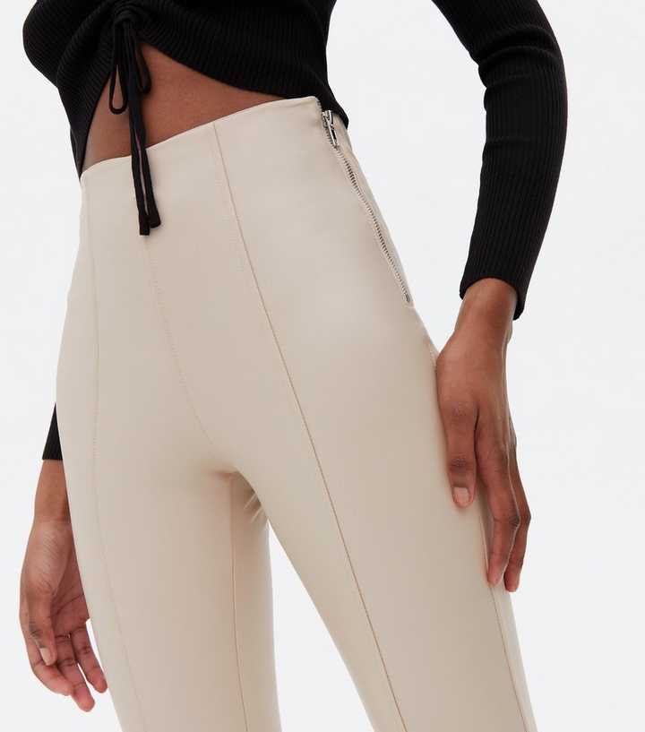 https://media2.newlookassets.com/i/newlook/693901413M2/womens/clothing/leggings/cream-leather-look-high-waist-zip-leggings.jpg?strip=true&qlt=50&w=720