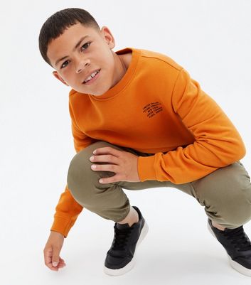 bright orange sweatshirt