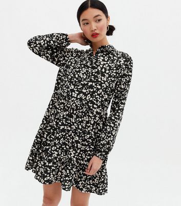 white and black leopard dress