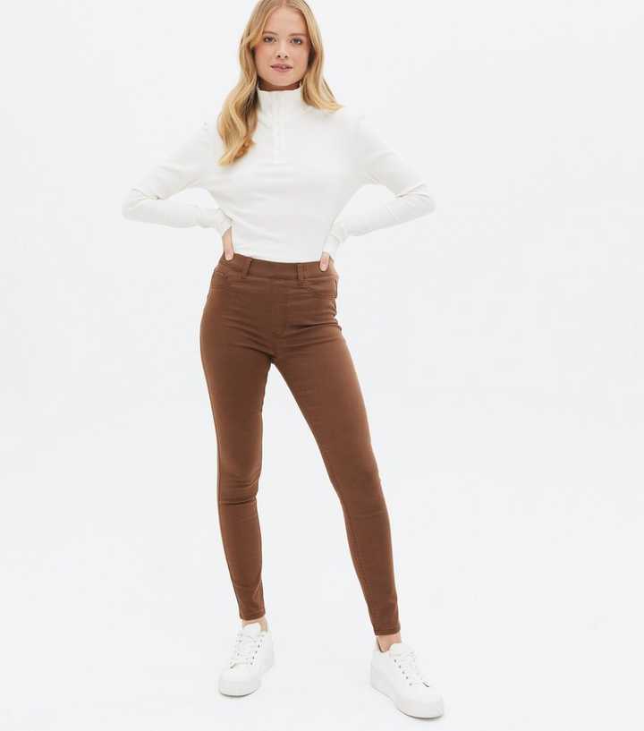 https://media2.newlookassets.com/i/newlook/696271227/womens/clothing/jeans/dark-brown-lift-shape-super-stretch-emilee-jeggings.jpg?strip=true&qlt=50&w=720