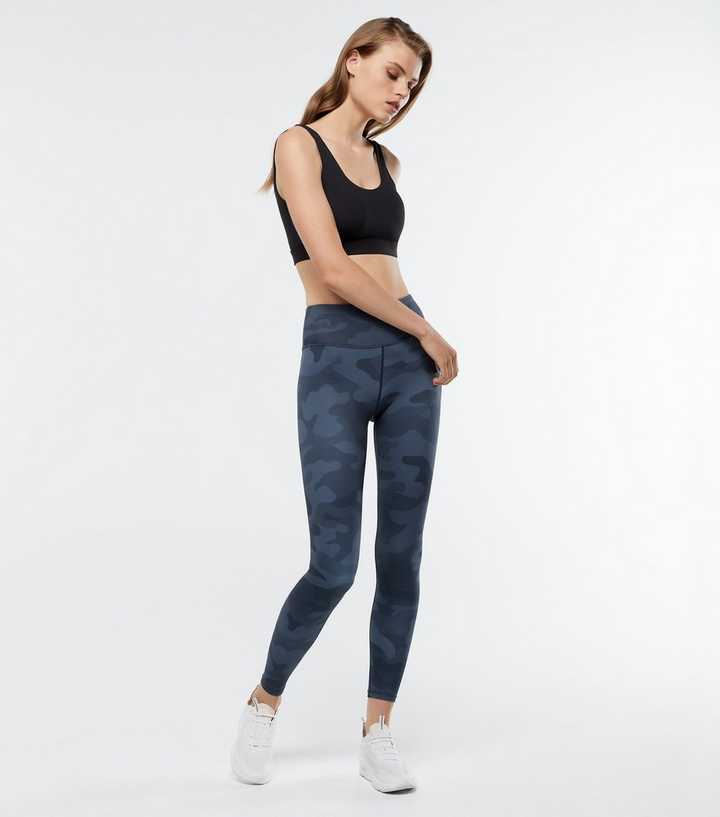 https://media2.newlookassets.com/i/newlook/696658249/womens/clothing/sportswear/marli-sport-navy-camo-leggings.jpg?strip=true&qlt=50&w=720