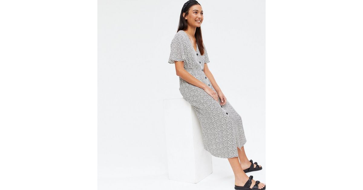 white spotty dresses