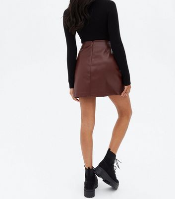 Click to view product details and reviews for Petite Burgundy Leather Look Mini Skirt New Look.