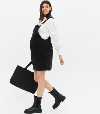 Click to view product details and reviews for Maternity Black Denim Mini Pinafore Dress New Look.