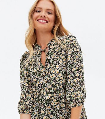 Black floral tunic top deals