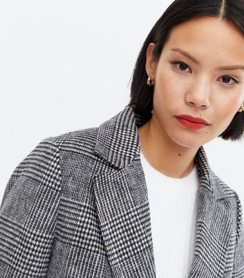 new look black dogtooth belted long coat