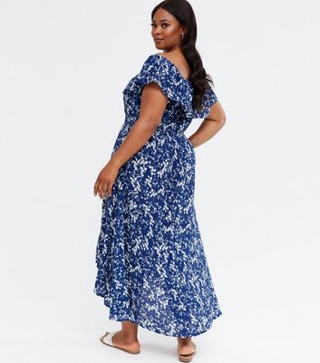 mela navy floral dipped hem maxi dress