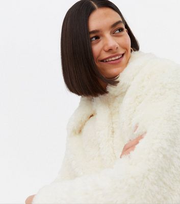 Click to view product details and reviews for Cream Faux Fur Collared Coat New Look.