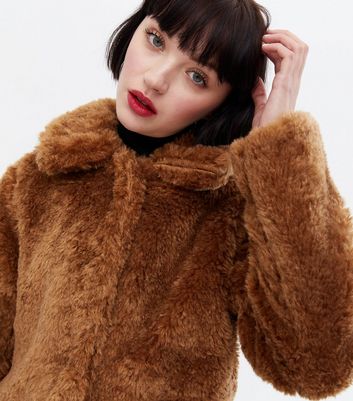 tan furry jacket