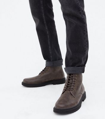 black boots with brown laces