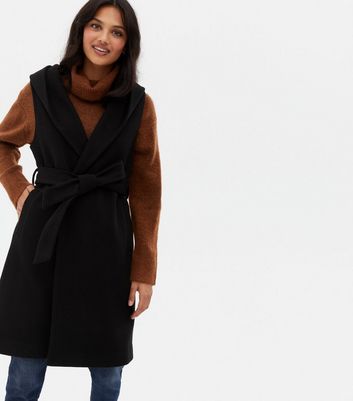 long black sleeveless jacket