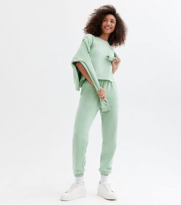 Click to view product details and reviews for Light Green Jersey Cuffed Joggers New Look.