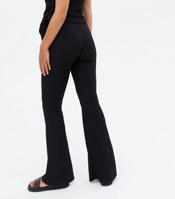 Click to view product details and reviews for Maternity Black Ribbed Jersey Flared Leggings New Look.