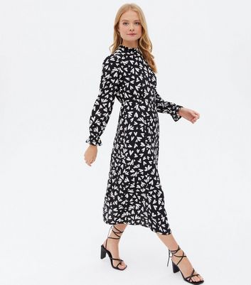 Click to view product details and reviews for Black Heart High Neck Split Midi Dress New Look.