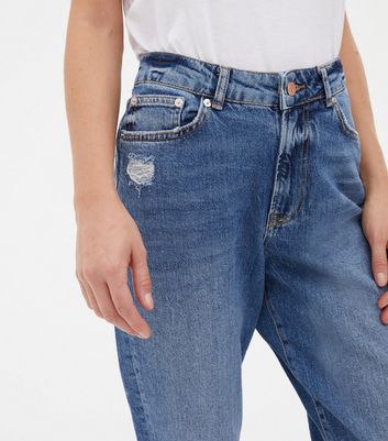 Click to view product details and reviews for Petite Blue Ripped High Waist Tori Mom Jeans New Look.