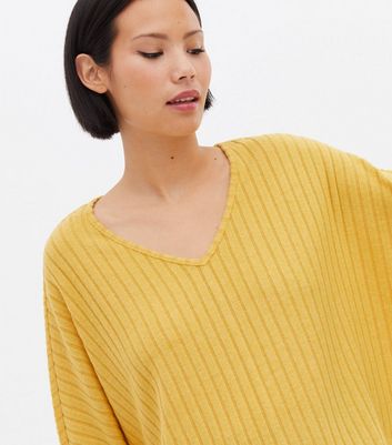 Click to view product details and reviews for Mustard Brushed Fine Knit V Neck Top New Look.