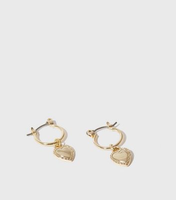 gold hoops with heart charms