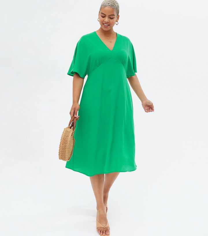Yumi Curves Green Flutter Sleeve Midi Dress