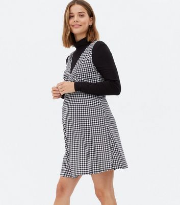 Click to view product details and reviews for Maternity Black Dogtooth Scuba V Neck Pinafore Dress New Look.