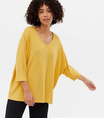 Click to view product details and reviews for Tall Yellow Brushed Fine Knit V Neck Top New Look.