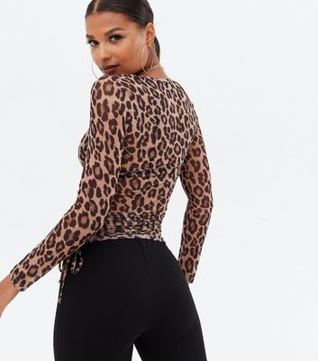 https://media2.newlookassets.com/i/newlook/803589209M4/womens/clothing/tops/black-leopard-print-mesh-ruched-side-long-sleeve-top.jpg