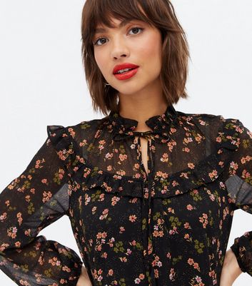 Click to view product details and reviews for Black Ditsy Floral Chiffon Frill Tie High Neck Mini Dress New Look.