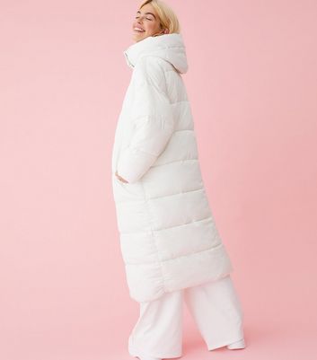 Womens white long store puffer coat