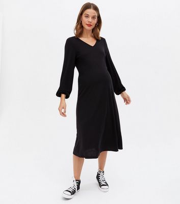 Click to view product details and reviews for Maternity Black Bow Back Midi Oversized Smock Dress New Look.