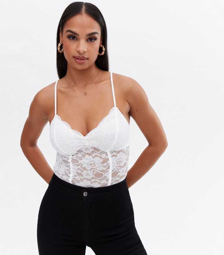https://media2.newlookassets.com/i/newlook/804493212/womens/clothing/tops/white-lace-strappy-bodysuit.jpg?strip=true&qlt=50&w=720