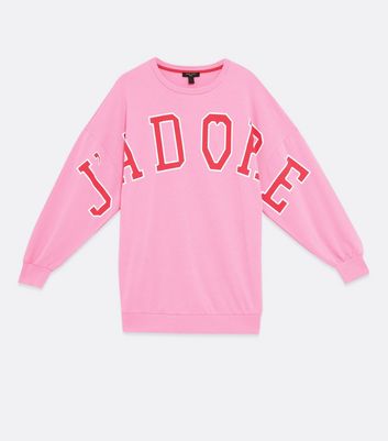 bright pink sweatshirt