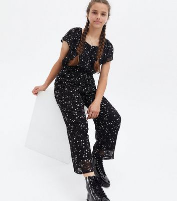 Black star jumpsuit on sale