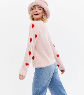 Click to view product details and reviews for Pink Fluffy Christmas Kisses Sequin Logo Jumper New Look.