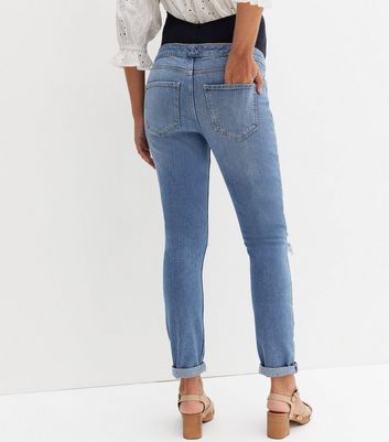 Click to view product details and reviews for Maternity Blue Ripped Knee Over Bump Tori Mom Jeans New Look.