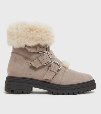 Heeled boots store with fur trim